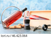 Wine aerator with bottles on color background. Стоковое фото, фотограф Pixel_shot / Фотобанк Лори