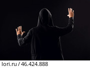 Professional hacker using virtual screen on dark background, back view. Стоковое фото, фотограф Pixel_shot / Фотобанк Лори