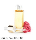 Bottle of raspberry essential oil on white background. Стоковое фото, фотограф Pixel_shot / Фотобанк Лори