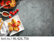 Plate with tasty conchiglioni pasta on dark background. Стоковое фото, фотограф Pixel_shot / Фотобанк Лори