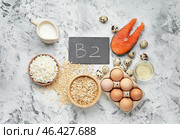 Healthy products rich in vitamin B2 on grey background. Стоковое фото, фотограф Pixel_shot / Фотобанк Лори