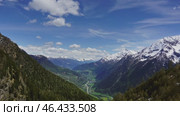 High snow mountains and valley in Switzerland. Стоковое видео, видеограф Михаил Коханчиков / Фотобанк Лори