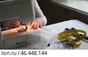 Women's hands sew on a sewing machine. Faceless. Fashion, creation and tailoring. Стоковое видео, видеограф Кутина Татьяна / Фотобанк Лори
