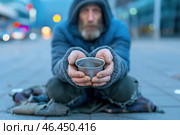 Homeless person sitting in the street and begging for money. Стоковое AI-изображение, AI-художник Евгений Харитонов / Фотобанк Лори