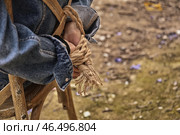 Заложница сидит на стуле на открытом воздухе. Стоковое фото, фотограф Pixel_shot / Фотобанк Лори