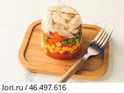 Доска с вкусным холодцом на столе. Стоковое фото, фотограф Pixel_shot / Фотобанк Лори