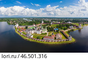 Aerial top view of ancient Kirillo Belozersky Monastery, fortress and lake Siverskoye on sunny summer day. Panoramic view to Church of the Transfiguration. Holy places, Kirillov, Vologda region Russia. Стоковое фото, фотограф Алексей Ширманов / Фотобанк Лори