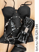 Black lingerie, shoes and bag encrusted with rhinestones. Стоковое фото, фотограф Александр Собко / Фотобанк Лори
