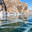 Baikal Lake in February sunny day. Beautiful winter landscape with blue smooth ice with cracks near Shibete mountain at Ust-Anga Bay. Natural background. Ice travels and outdoor recreation. Стоковое фото, фотограф Виктория Катьянова / Фотобанк Лори
