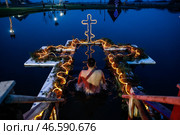 Верующий во время крещенских купаний. Стоковое фото, фотограф Виталий Невар / ТАСС / Фотобанк Лори