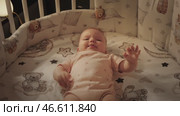 Cranky Baby in Crib. Crying and Refusing to Sleep. Стоковое видео, видеограф Михаил Матвеев / Фотобанк Лори