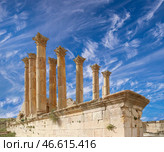 Temple of Zeus, Jordanian city of Jerash (Gerasa of Antiquity), capital and largest city of Jerash Governorate, Jordan. Against the background of a beautiful sky with clouds (2016 год). Стоковое фото, фотограф Владимир Журавлев / Фотобанк Лори