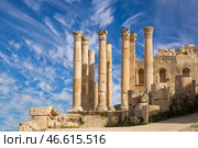Temple of Zeus, Jordanian city of Jerash (Gerasa of Antiquity), capital and largest city of Jerash Governorate, Jordan. Against the background of a beautiful sky with clouds (2016 год). Стоковое фото, фотограф Владимир Журавлев / Фотобанк Лори