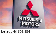 Вывеска официального дилера Mitsubishi motors на фоне тревожного багрового неба. Редакционное видео, видеограф FotograFF / Фотобанк Лори