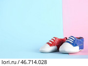 Милые стильные детские туфельки на цветном фоне. Стоковое фото, фотограф Pixel_shot / Фотобанк Лори