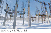 Beautiful power plant with lots of poles and cable conductors. Стоковое фото, фотограф David Kashakhi / Фотобанк Лори