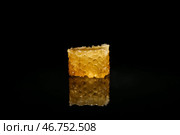 Сладкий медовый сот на черном фоне. Стоковое фото, фотограф Pixel_shot / Фотобанк Лори
