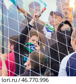 Russia, Samara. 30. 08. 2015. active young football fans at the stadium. Text in Russian: Samara Krylya Sovetov. Редакционное фото, фотограф Акиньшин Владимир / Фотобанк Лори