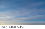 Clear blue sky with soft wispy cloud, time lapse. Natural background with copy space. Стоковое видео, видеограф Андрей Журавлев / Фотобанк Лори