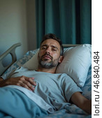 A man lies in a hospital bed, facing the challenges of his illness with determination. His expression reflects a blend of comfort and hope amid the hardships he endures. Стоковое AI-изображение, AI-художник Юлия Петровская / Фотобанк Лори