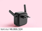 Черный повторитель Wi-Fi на розовом фоне. Стоковое фото, фотограф Pixel_shot / Фотобанк Лори