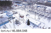 Electrical substation with transformers distributing high voltage throughout city. Стоковое фото, фотограф David Kashakhi / Фотобанк Лори