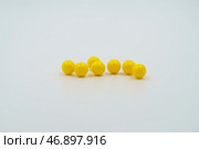 Yellow vitamin capsules, dietary supplements. Medicinal pills, pharmaceutical healthcare products, drugs for medical treatment, therapeutic medication, pharmacological, health aid. Стоковое фото, фотограф Андрей Ка / Фотобанк Лори