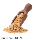 Wooden ladle with buckwheat flakes isolated on white background, packaging design element, sharpness across the frame. Стоковое фото, фотограф Сергей Чайко / Фотобанк Лори