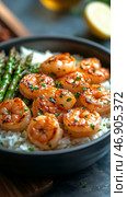 Delicious Shrimp and Grits With Asparagus Served in a Bowl. Стоковое AI-изображение, AI-художник Юлия Гапеенко / Фотобанк Лори