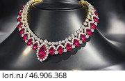 Ruby and diamond necklace rotating on black mannequin. Стоковое AI-видео, аниматор Юрий Поздников / Фотобанк Лори
