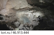 Beautiful walls of lighted cave with formations. Стоковое фото, фотограф David Kashakhi / Фотобанк Лори