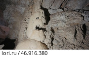 Underground cave formations of stalactites and stalagmites. Стоковое фото, фотограф David Kashakhi / Фотобанк Лори