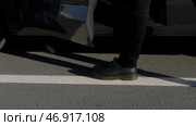HDR.A blue car into which a man in black leather shoes and dark jeans steps. Стоковое фото, фотограф David Kashakhi / Фотобанк Лори