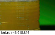 Alcohol beverage isolated on a colorful wall background. Стоковое фото, фотограф David Kashakhi / Фотобанк Лори