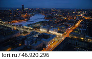 Skyscrapers with illumination in city at night, top view from One building. Редакционное фото, фотограф David Kashakhi / Фотобанк Лори