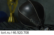 Boxing punch bag on black background. Стоковое фото, фотограф David Kashakhi / Фотобанк Лори