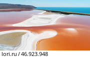 Beautiful aerial view of Laguna Colorada or Red Lake, a shallow salt lake in the southwest of the Altiplano of Bolivia. Стоковое фото, фотограф David Kashakhi / Фотобанк Лори