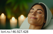 Beautiful woman enjoys a soothing facial treatment in a serene spa environment. В безмятежной обстановке спа-салона красивая женщина принимает успокаивающие процедуры для лица. Мягкий свет свечей усиливает расслабляющую атмосферу, пока она переживает момент чистого блаженства. Стоковое AI-изображение, AI-художник Katsiaryna Repich / Фотобанк Лори