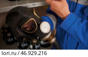 Testing of new gas masks in the workflow at factories. Стоковое фото, фотограф David Kashakhi / Фотобанк Лори