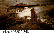 View inside of underground cave, concept of adventure and speleology. Стоковое фото, фотограф David Kashakhi / Фотобанк Лори