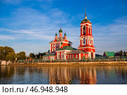 The Golden Ring of Russia, the city of Pereslavl-Zalessky. The Church of the Forty Sevastian Martyrs is reflected at sunset in Pleshcheyev Lake. Стоковое фото, фотограф Photojuli / Фотобанк Лори