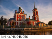 The Golden Ring of Russia, the city of Pereslavl-Zalessky. The Church of the Forty Sevastian Martyrs is reflected at sunset in Pleshcheyev Lake. Стоковое фото, фотограф Photojuli / Фотобанк Лори
