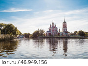 The Golden Ring of Russia, the city of Pereslavl-Zalessky. The Church of the Forty Sevastian Martyrs is reflected in the afternoon in Pleshcheyev Lake. Стоковое фото, фотограф Photojuli / Фотобанк Лори