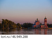 The Golden Ring of Russia, the city of Pereslavl-Zalessky. The Church of the Forty Martyrs of Sebaste at a beautiful pink sunset on the side of Lake Pleshcheyev. Стоковое фото, фотограф Photojuli / Фотобанк Лори