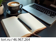 Рабочее пространство с открытым блокнотом, ручкой, чашкой кофе и ноутбуком на темном столе. Стоковое AI-изображение, AI-художник Елена Болотина / Фотобанк Лори