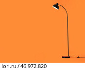 Современный торшер на цветном фоне. Стоковое фото, фотограф Pixel_shot / Фотобанк Лори