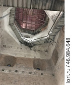 Dilapidated staircase in the old stone high bell tower. Стоковое фото, фотограф David Kashakhi / Фотобанк Лори