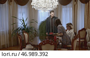 Bandits in house of rich victim with frightened wife. Стоковое фото, фотограф David Kashakhi / Фотобанк Лори