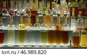Bottles of tinctures on bar in nightclub. Стоковое фото, фотограф David Kashakhi / Фотобанк Лори