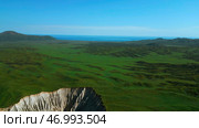 Aerial view of summer green valley and stony cleft. Стоковое фото, фотограф David Kashakhi / Фотобанк Лори